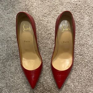 Christian Louboutin Kate snake skin pumps